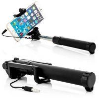 Extensible selfie stick with integrated trigger